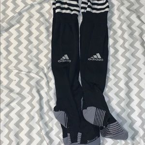 2 pairs of adidas soccer socks.